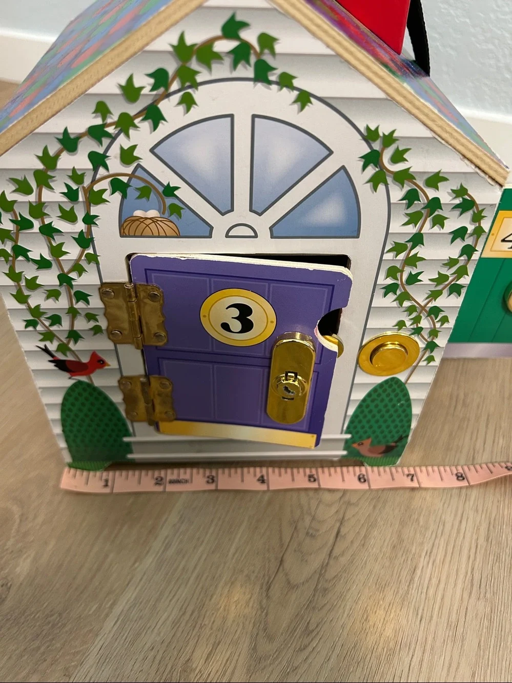Melissa & DougTake-Along Wooden Doorbell Dollhouse -Doorbell Sounds, Keys-Toy